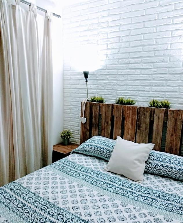 Postel nebo postele na pokoji v ubytování Nuestra Casa en Gran Alacant