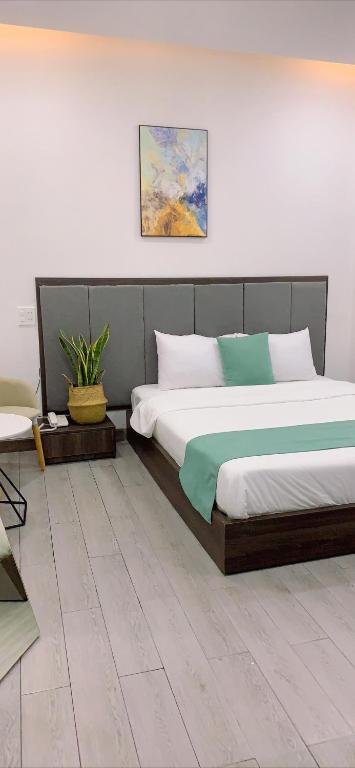 Postel nebo postele na pokoji v ubytování Home Thiên Trang 3