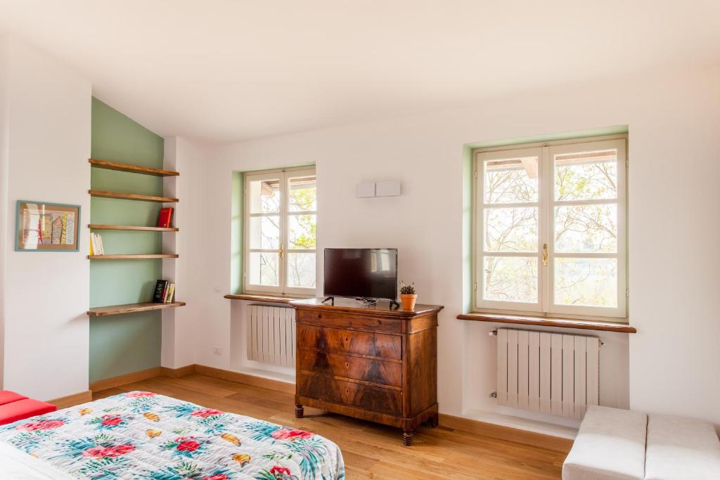 Łóżko lub łóżka w pokoju w obiekcie AMERICA NEI BOSCHI B&B