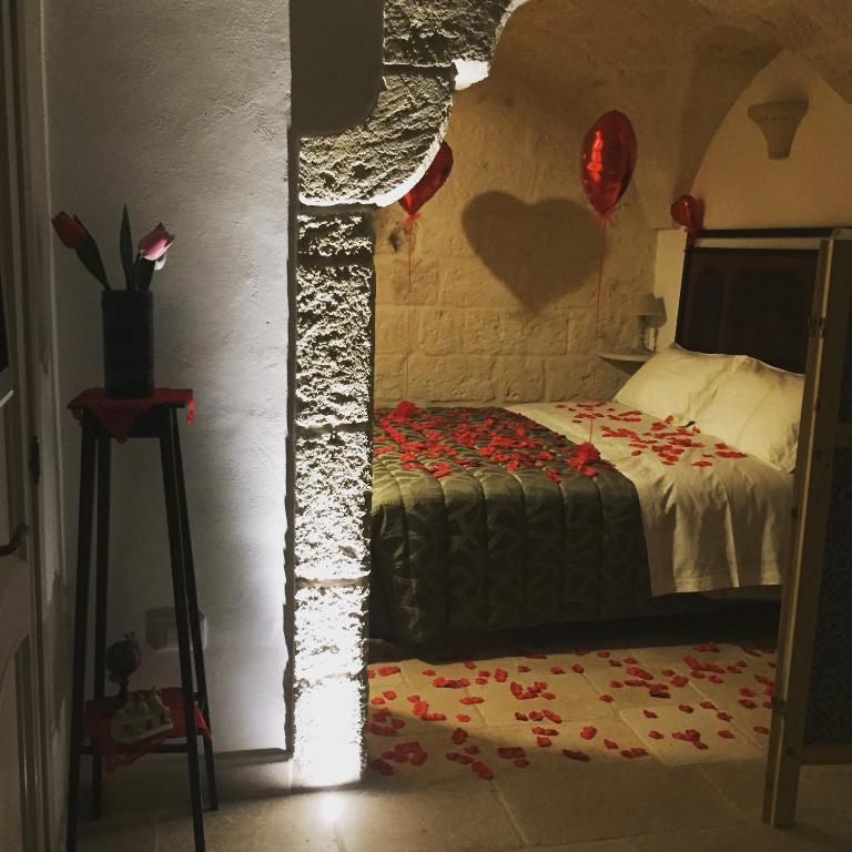 Postel nebo postele na pokoji v ubytování Al Caveau - Holiday House