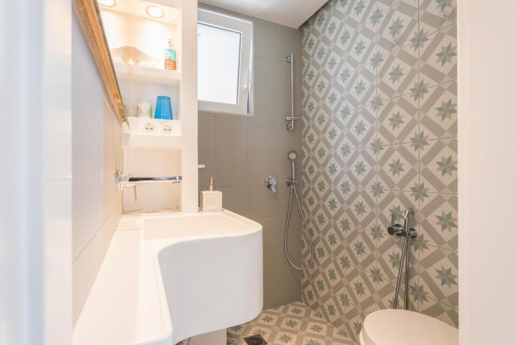 Kúpeľňa v ubytovaní Seafront Penthouse LEO