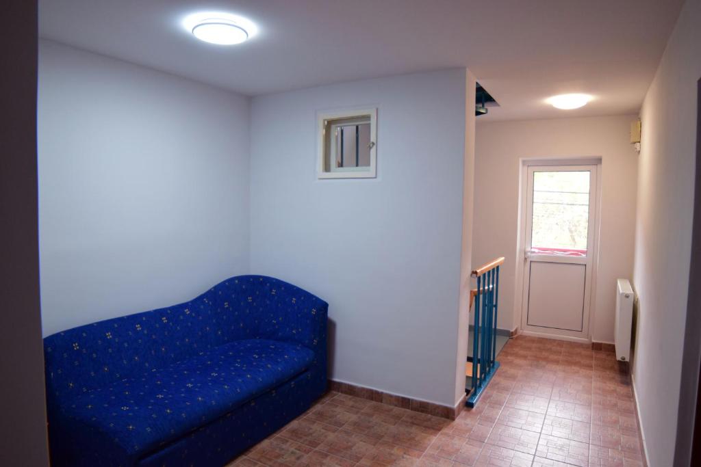 Postel nebo postele na pokoji v ubytování Pensiunea Arinul