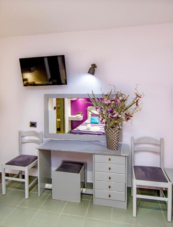 TV a/nebo společenská místnost v ubytování Kahlua Hotel Apartments