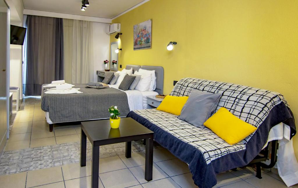 Postel nebo postele na pokoji v ubytování Kahlua Hotel Apartments