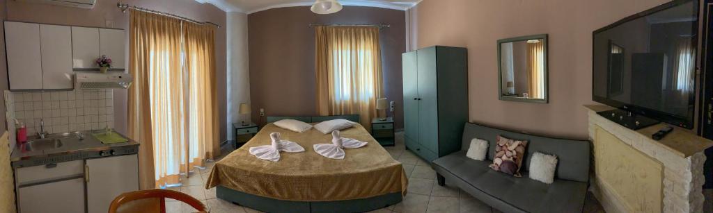 A bed or beds in a room at Acheron Springs-Markou Ilias