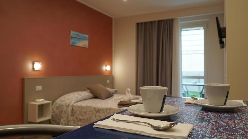 Postel nebo postele na pokoji v ubytování Asterias Residence - Rooms & SPA