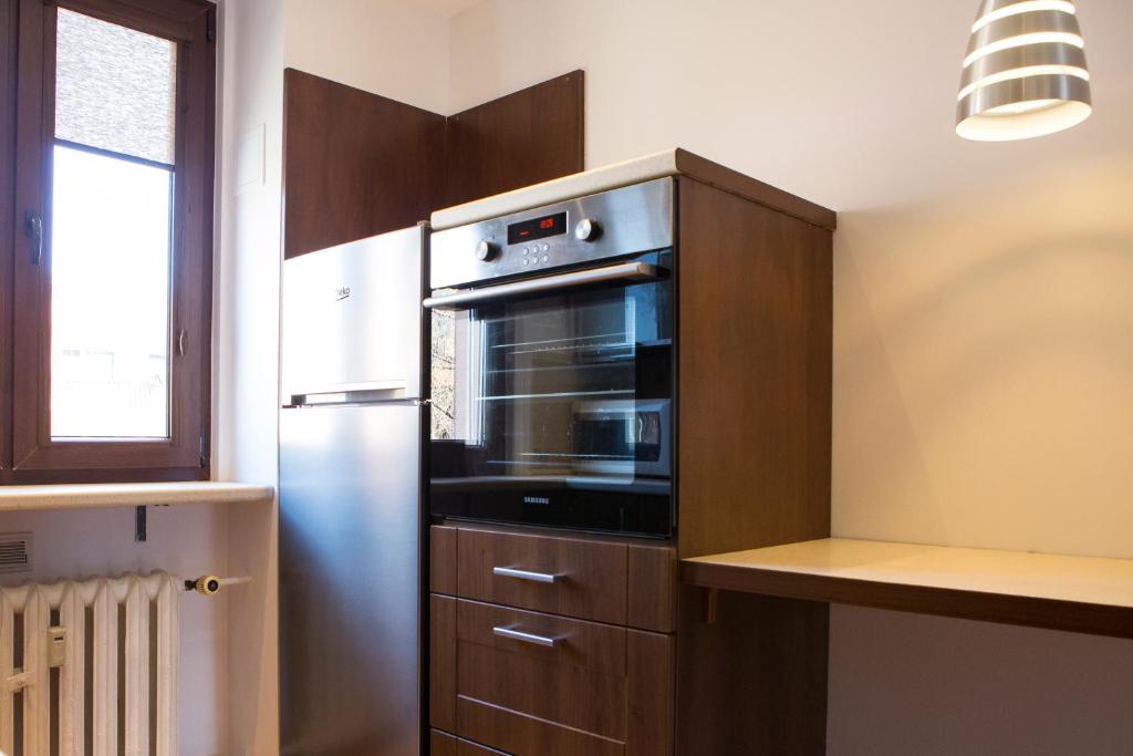 Kuchyňa alebo kuchynka v ubytovaní May Land Apartment
