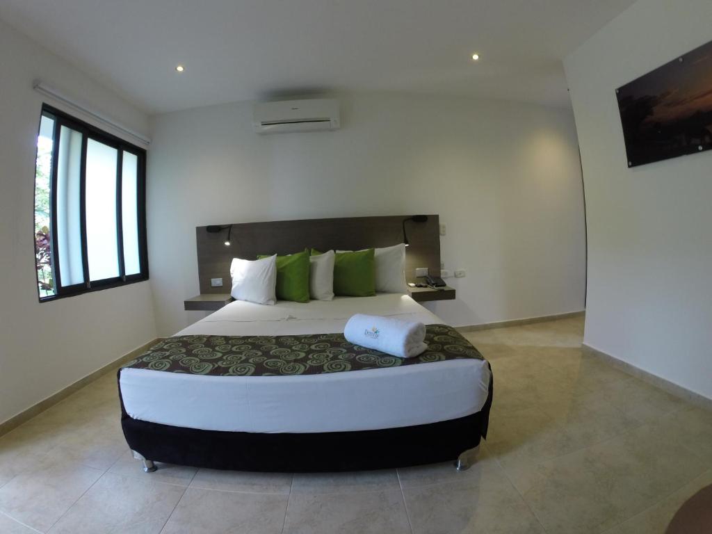 Postel nebo postele na pokoji v ubytování Hotel Boutique Duranta