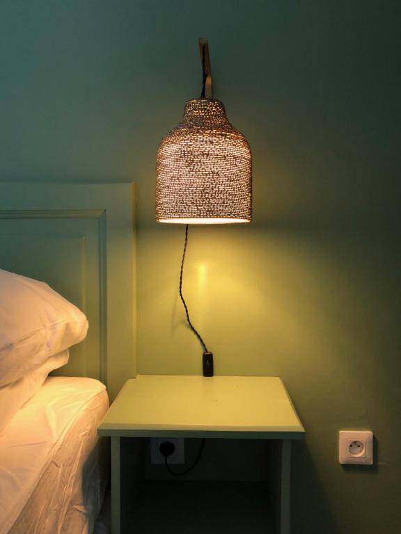 Postel nebo postele na pokoji v ubytování Hotel Pelican
