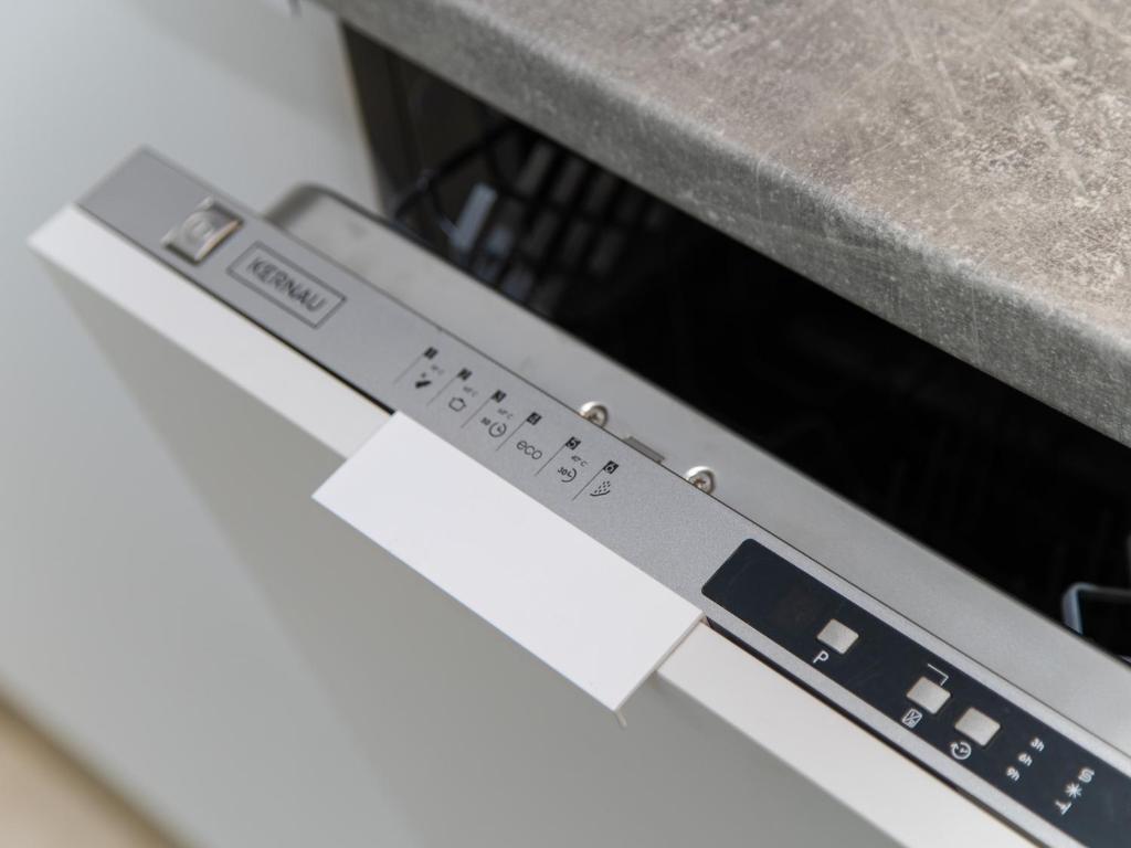 a close up of a laptop computer with a keyboard at Apartamenty Baltia Kołobrzeg - Bliżej Morza in Kołobrzeg