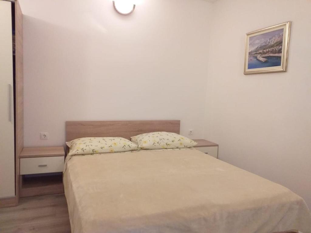 Posteľ alebo postele v izbe v ubytovaní Apartments Villa Antony