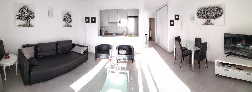Posedenie v ubytovaní Precioso Apartamento Frente Al Mar