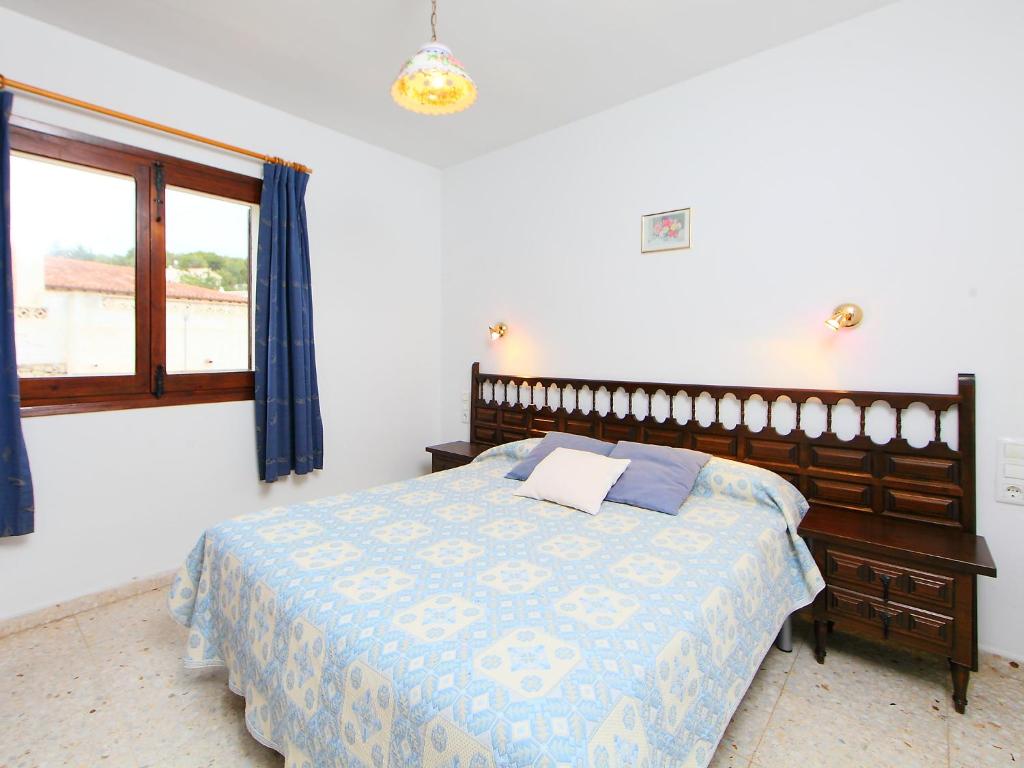 Postel nebo postele na pokoji v ubytování Holiday Home Marianne by Interhome