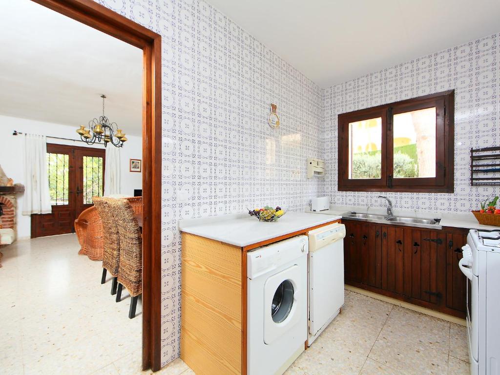 Kuchyň nebo kuchyňský kout v ubytování Holiday Home Marianne by Interhome
