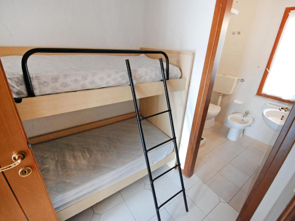 Posteľ alebo postele v izbe v ubytovaní Apartment Lecci-1 by Interhome