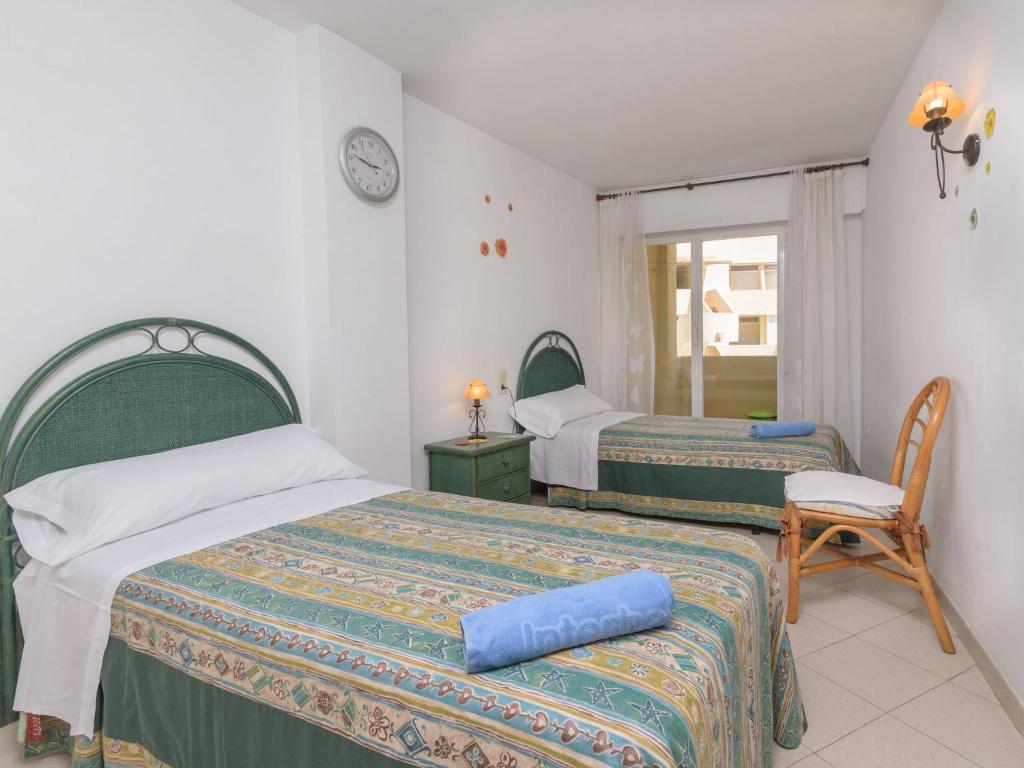 Posteľ alebo postele v izbe v ubytovaní Apartment Girasol by Interhome