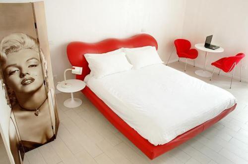 A bed or beds in a room at Wrh Trastevere