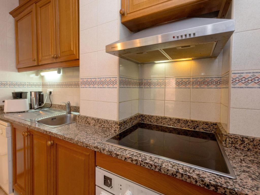 Kuchyňa alebo kuchynka v ubytovaní Apartment Primer de Maig by Interhome