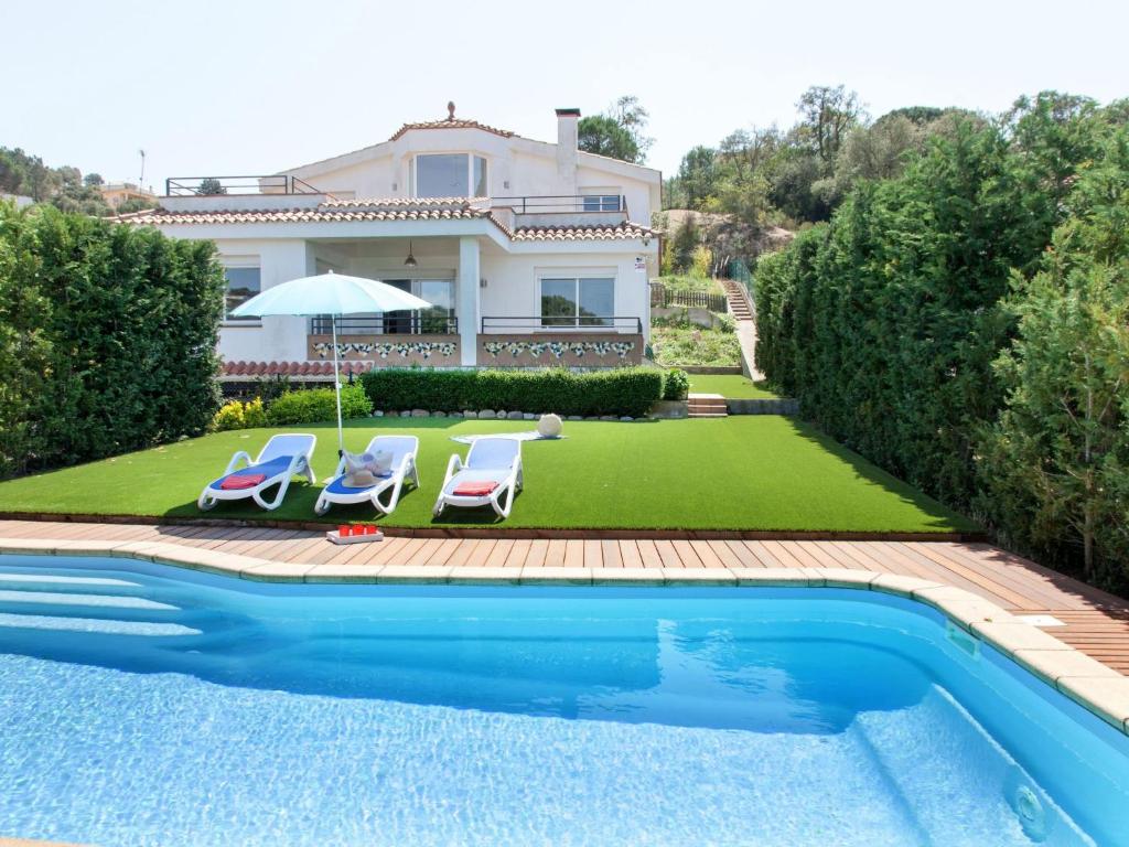 Bazén v ubytovaní Holiday Home Costabella by Interhome alebo v jeho blízkosti