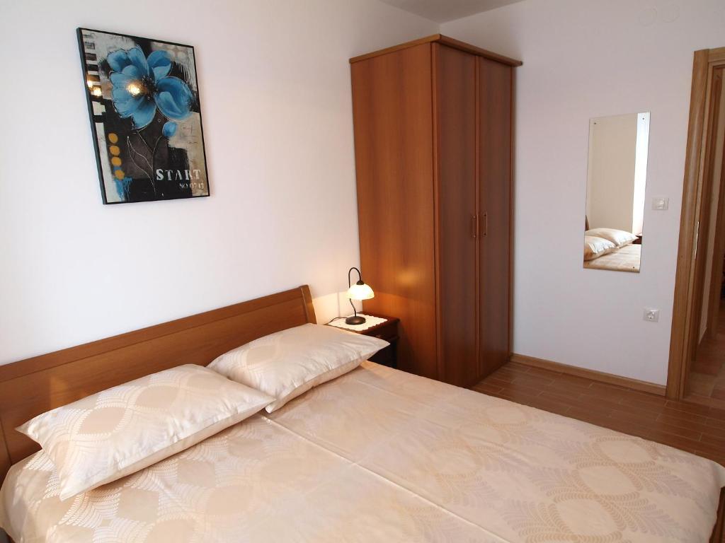 Postel nebo postele na pokoji v ubytování Holiday Home Mirela by Interhome