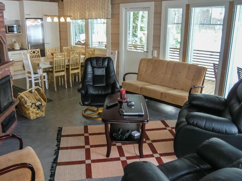 Posezení v ubytování Holiday Home Huvila ferdinand by Interhome