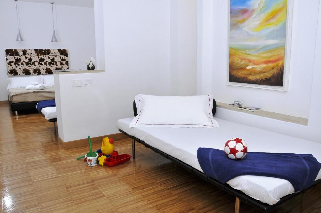 Postel nebo postele na pokoji v ubytování Hotel Del Conte
