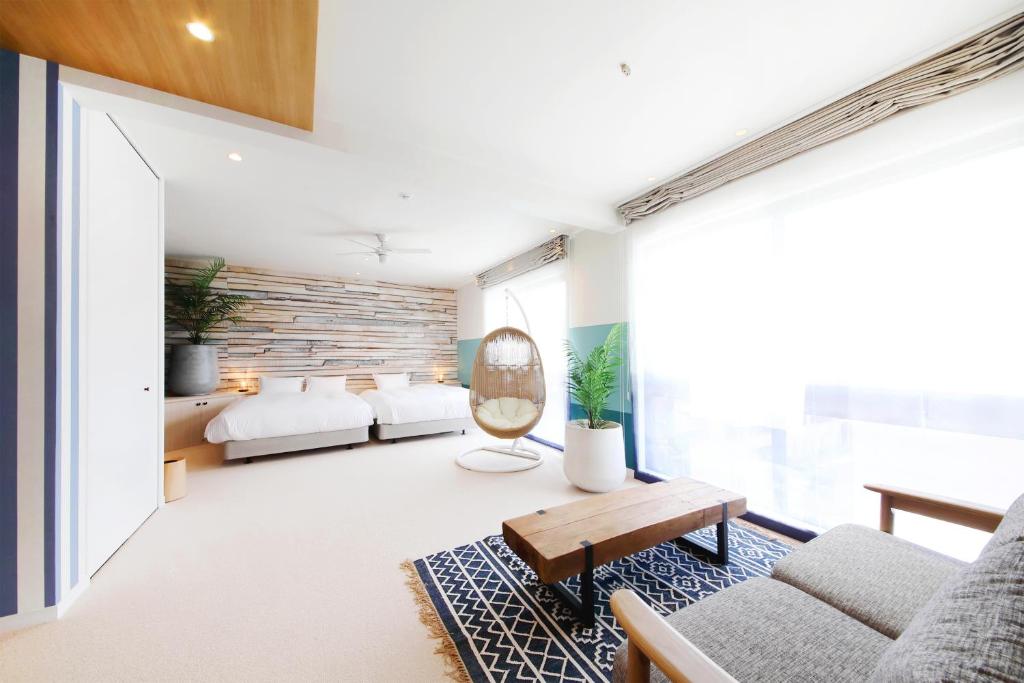 Postel nebo postele na pokoji v ubytování HOTEL SHIKISAI KYOTO