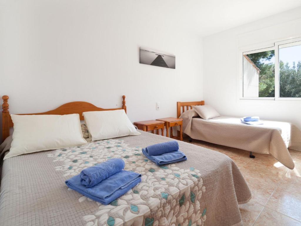 Postel nebo postele na pokoji v ubytování Villa Villa Sant Jordi by Interhome