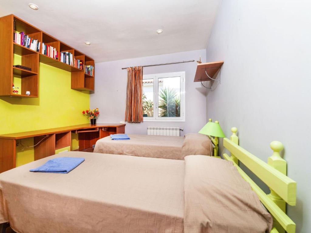Postel nebo postele na pokoji v ubytování Holiday Home Mari by Interhome
