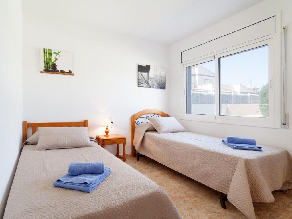 Postel nebo postele na pokoji v ubytování Villa Villa Sant Jordi by Interhome