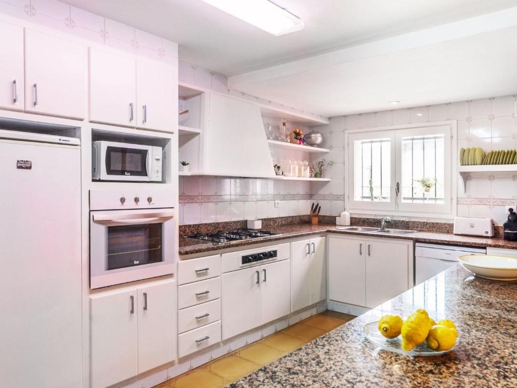 A kitchen or kitchenette at Holiday Home Platja by Interhome