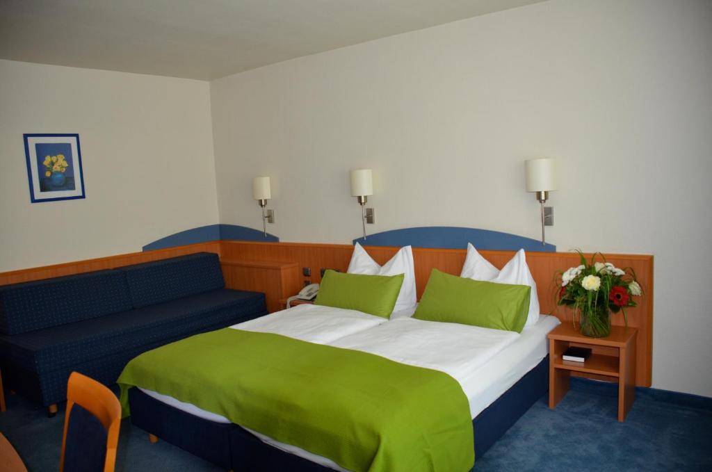 Katil atau katil-katil dalam bilik di Landhotel Sulzbacher Hof