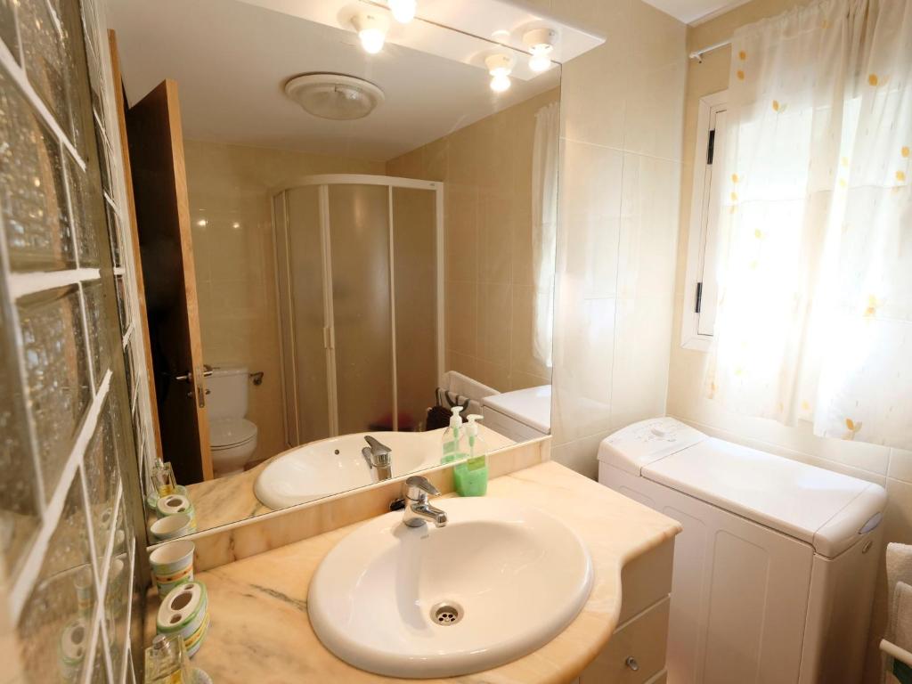 A bathroom at Apartment DMS IV-3 by Interhome