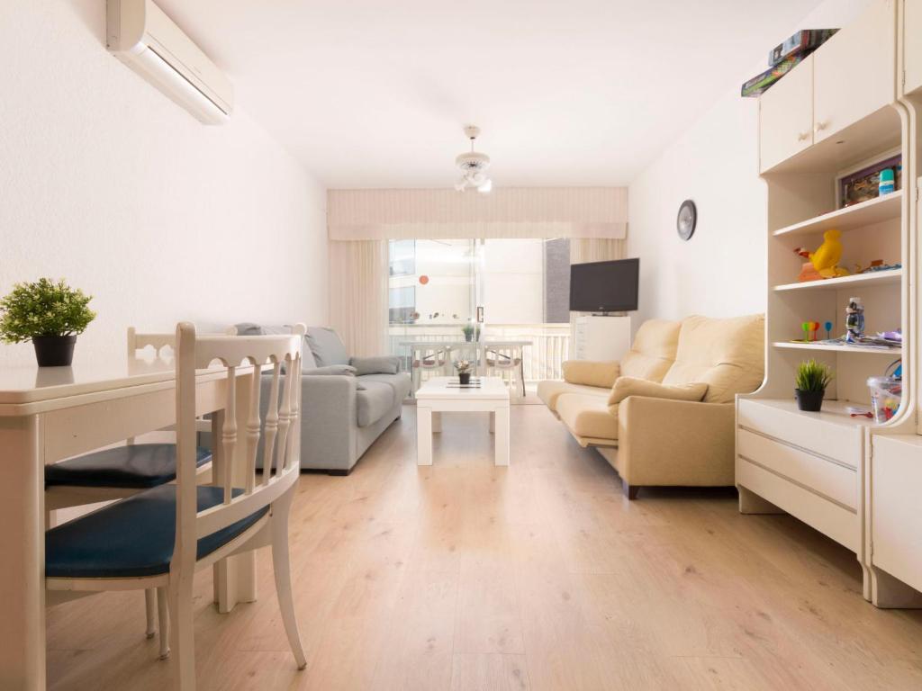 A seating area at Apartment DMS IV-3 by Interhome