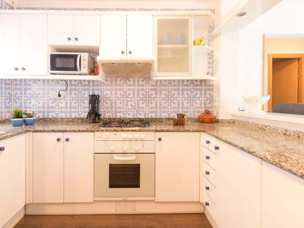 A kitchen or kitchenette at Apartment DMS IV-3 by Interhome