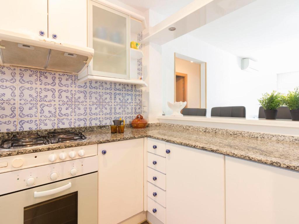 A kitchen or kitchenette at Apartment DMS IV-3 by Interhome