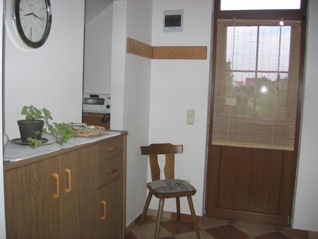 A kitchen or kitchenette at Bodzavirág Apartman
