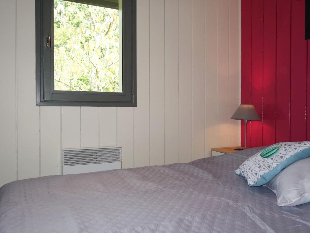 Postel nebo postele na pokoji v ubytování Chalet Le Bois d'Amour by Interhome