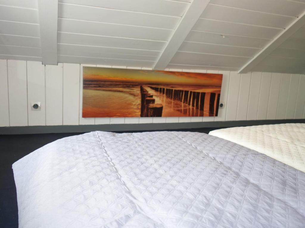 Postel nebo postele na pokoji v ubytování Chalet Le Bois d'Amour by Interhome