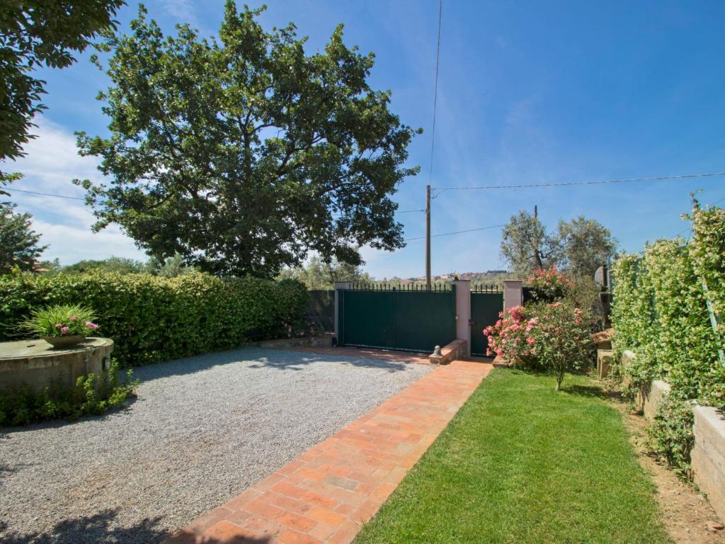 A garden outside Holiday Home Villa il Pellicano by Interhome