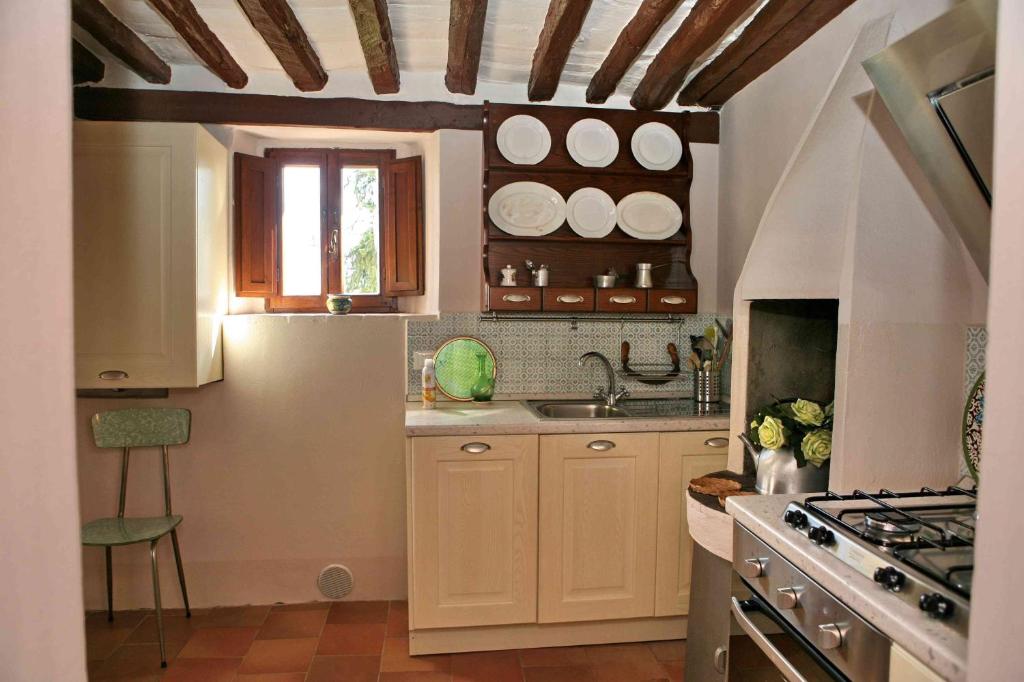 Kuchyň nebo kuchyňský kout v ubytování Residenza Antico Chianti