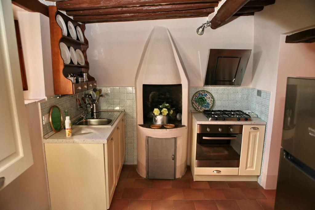 Kuchyň nebo kuchyňský kout v ubytování Residenza Antico Chianti