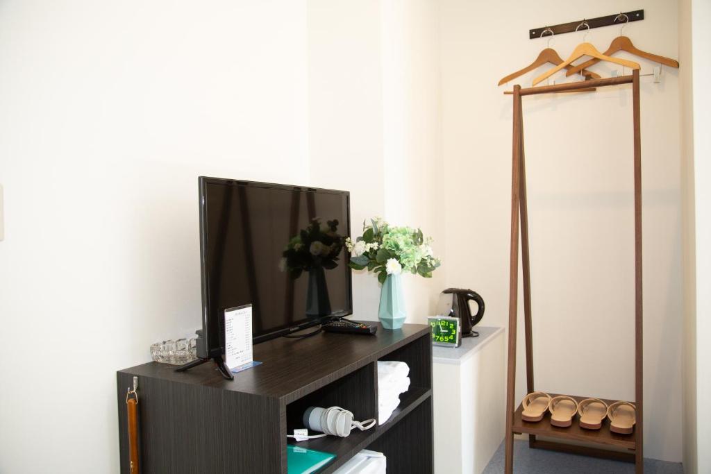 Kuchyň nebo kuchyňský kout v ubytování Tabata Oji Hotel