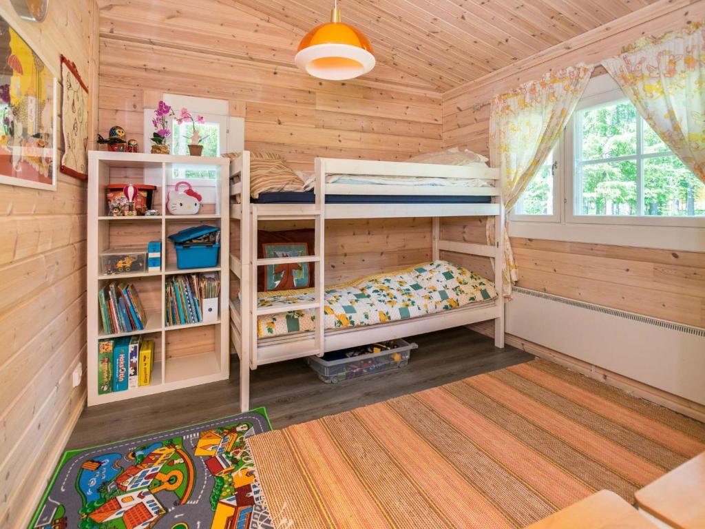 Postel nebo postele na pokoji v ubytování Holiday Home Isoniemi by Interhome