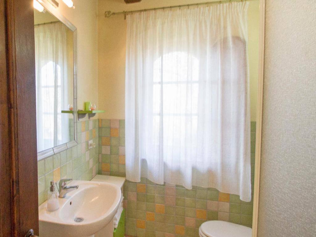 A bathroom at Holiday Home Montecucco Winery by Interhome