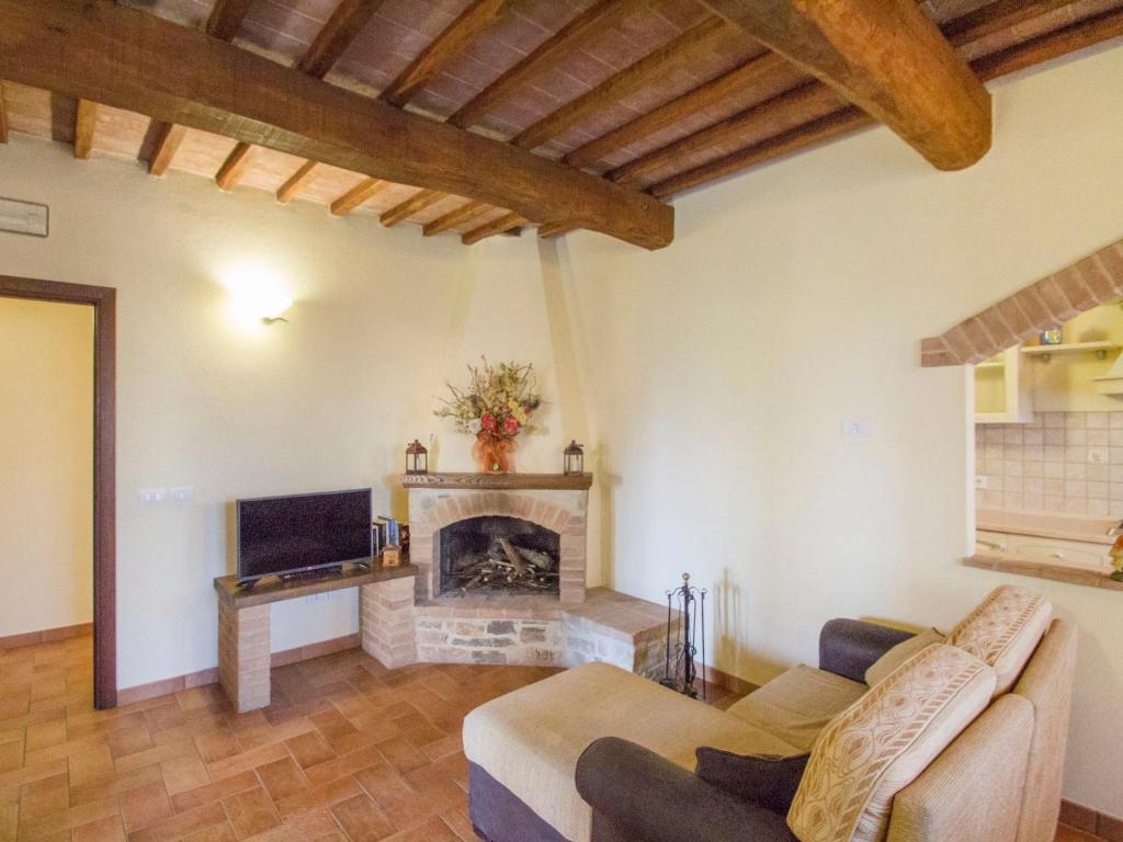 A seating area at Holiday Home Montecucco Winery by Interhome