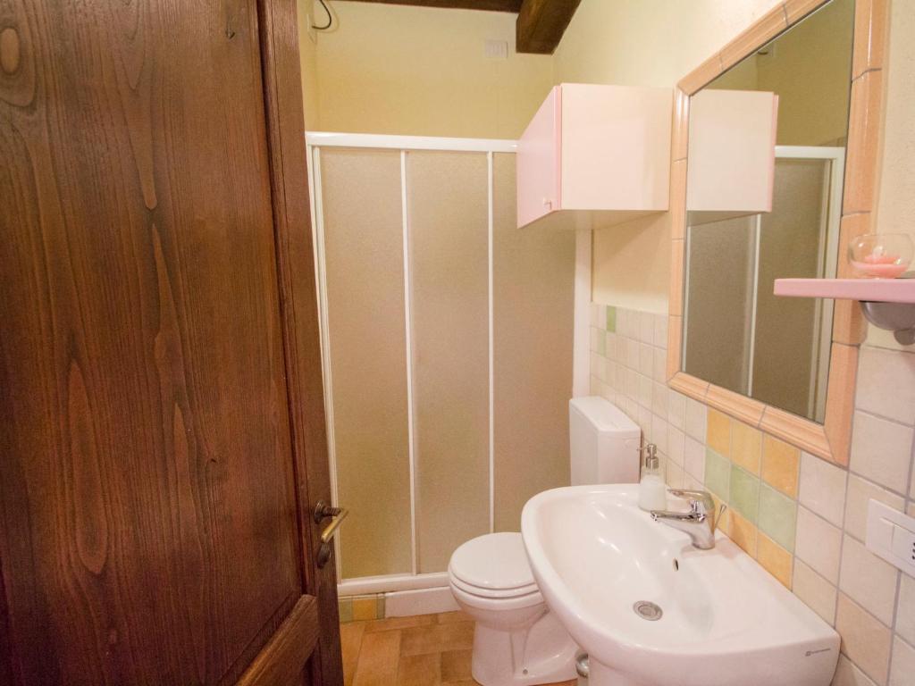 A bathroom at Holiday Home Montecucco Winery by Interhome