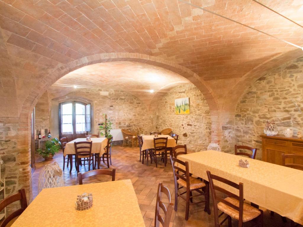 A seating area at Holiday Home Montecucco Winery by Interhome