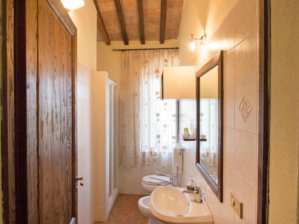 A bathroom at Holiday Home Montecucco Winery by Interhome