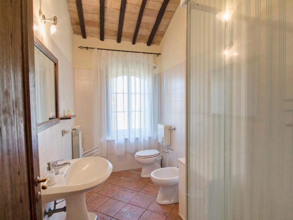 A bathroom at Holiday Home Montecucco Winery by Interhome
